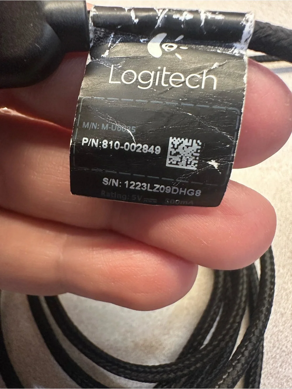 Logitech G600 Black Wired Ergonomic Gaming Mouse with 12 button thumb grid.